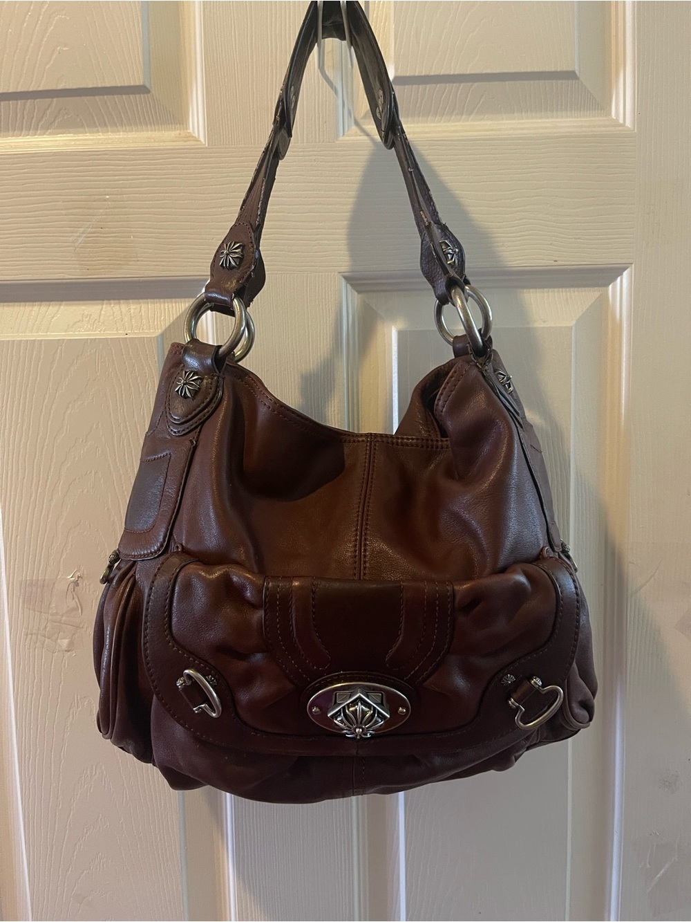 B Makowsky Brown Leather Hobo Shoulder Bag with silver antique tone hardwares .